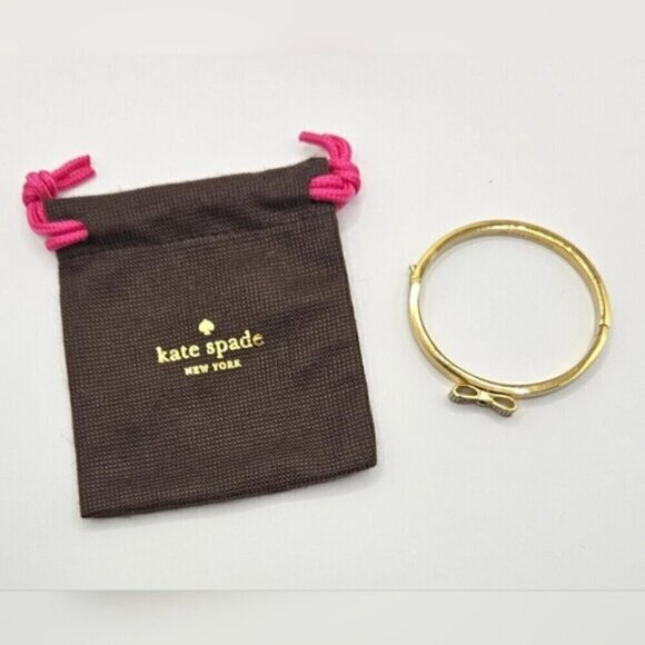 Kate Spade New York Gold-Tone Bow Bangle Bracelet with Crystals + Pouch - Picture 4 of 10